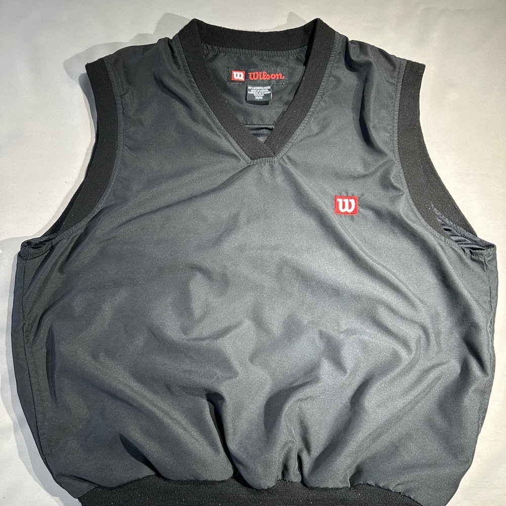 Wilson Dark Gray Apparel with Red Emblem